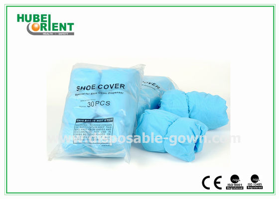 OEM Disposable 35gsm Nonwoven Shoe Cover With Non Slip Stripes Sole